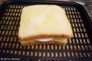 Place the sandwich on the air fryer tray or in the basket.