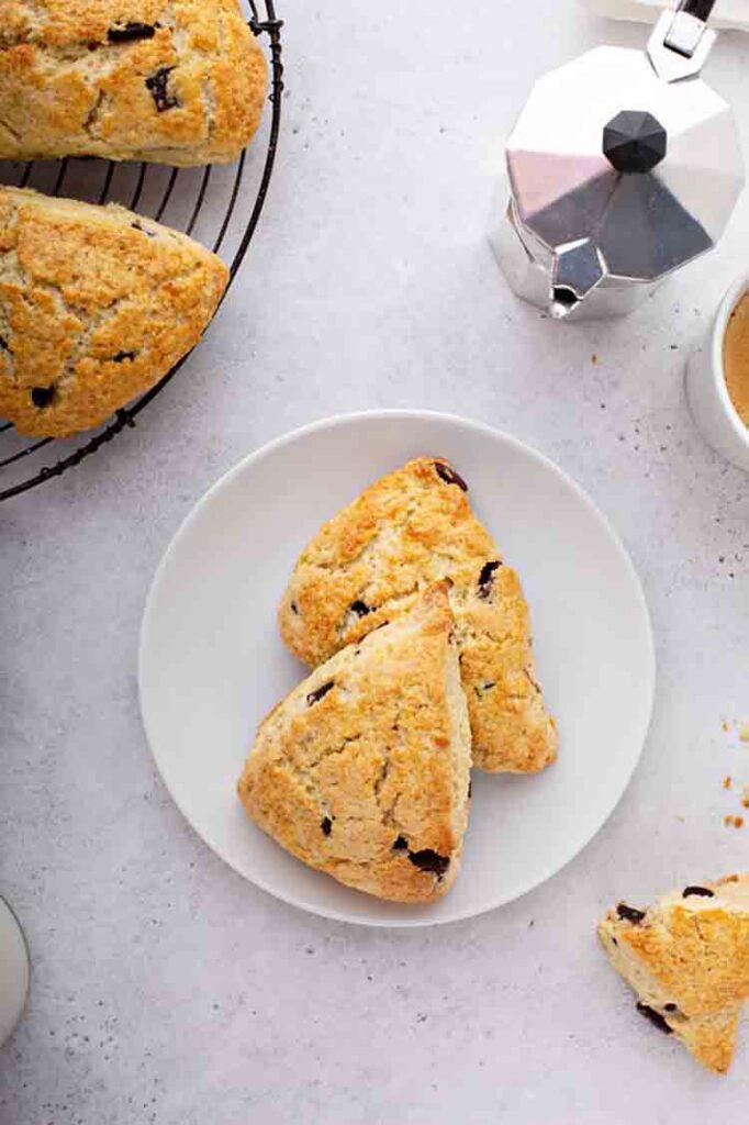 Can You Bake In An Air Fryer? Homemade chocolate chunk scones with coffee for breakfast.