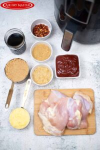All the ingredients for this Air Fryer Huli Huli Chicken Recipe measured out individually in individual small bowls.